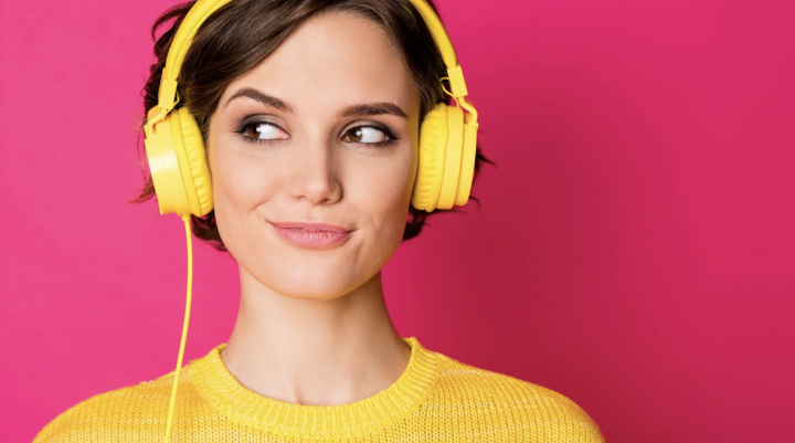 Woman listening to headphones