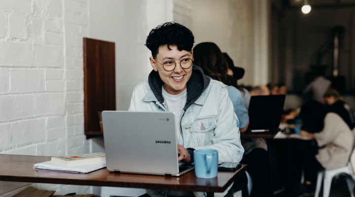 Person in cafe using computer